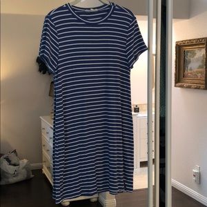 T-shirt Dress cute with white sneakers.